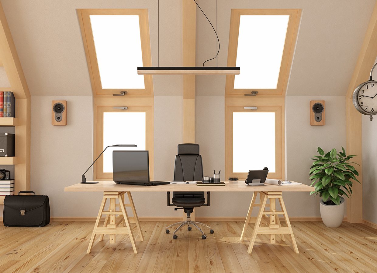 Modern office in the attic with wooden desk, bookcase and two windows - 3d rendering